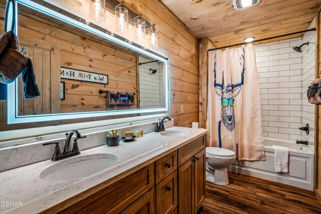 1606 Dove Wing Way, Sevierville, TN 37862 - bathroom featuring wood finished floors, wooden walls, double vanity, shower / bath combo with shower curtain, and wood ceiling