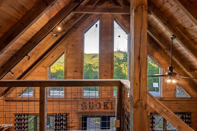 1606 Dove Wing Way, Sevierville, TN 37862 - detailed view of track lighting, a wood ceiling with exposed beams, wooden walls, and a ceiling fan