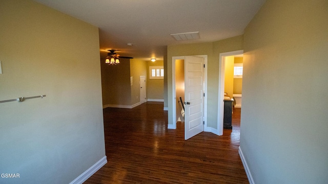 hallway featuring dark hardwood / wood-style flooring