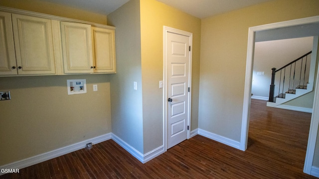 laundry area featuring electric dryer hookup, dark wood-type flooring, hookup for a washing machine, and cabinets