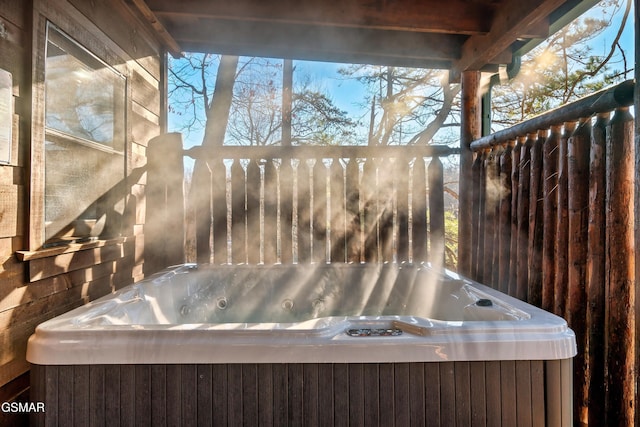 exterior space featuring a hot tub