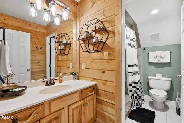 334 Greenwood Way, Pigeon Forge, TN 37863 - full bathroom featuring wooden walls, toilet, vanity, tile patterned flooring, and a shower with shower curtain