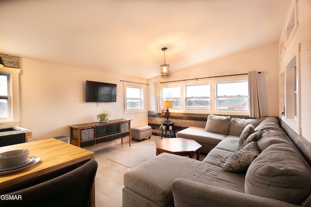 living room featuring vaulted ceiling