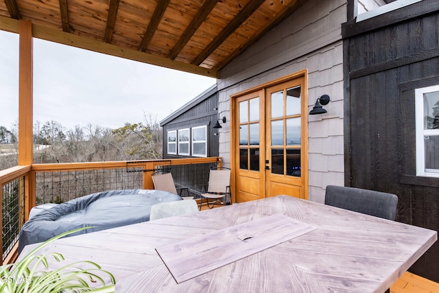 wooden terrace featuring french doors