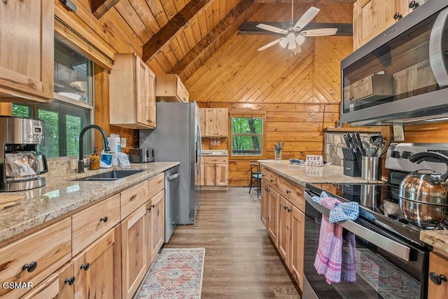 4372 Boogertown Rd Unit 1, Sevierville, TN 37876 - kitchen with appliances with stainless steel finishes, a sink, wood ceiling, plenty of natural light, and wood walls