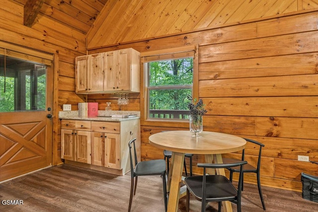 4372 Boogertown Rd Unit 1, Sevierville, TN 37876 - dining area featuring lofted ceiling, wood walls, wood ceiling, and dark wood-type flooring