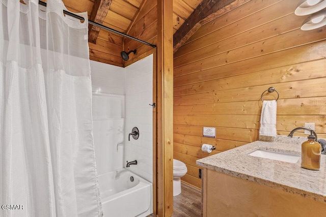 4372 Boogertown Rd Unit 1, Sevierville, TN 37876 - bathroom featuring wooden walls, toilet, shower / bath combination with curtain, vanity, and wood finished floors
