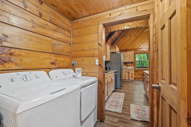 4372 Boogertown Rd Unit 1, Sevierville, TN 37876 - laundry room with separate washer and dryer, wooden ceiling, wood walls, and dark wood-style floors