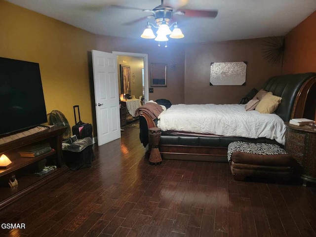 bedroom featuring dark wood-type flooring and ceiling fan