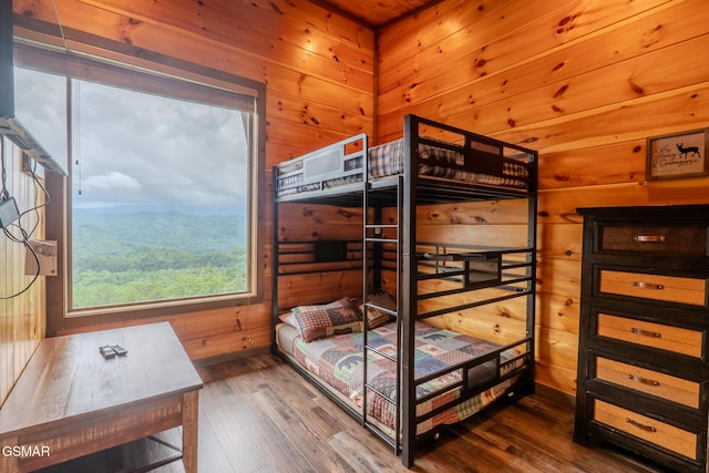 2414 Hackberry Dr, Sevierville, TN 37862 - bedroom with wood finished floors and wood walls