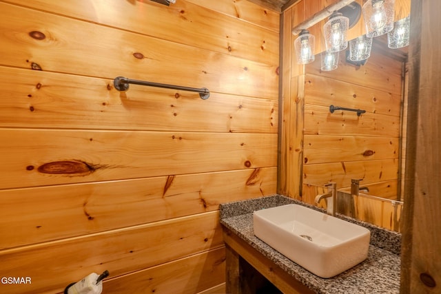 2414 Hackberry Dr, Sevierville, TN 37862 - bathroom featuring wood walls, a sauna / steam room, and vanity