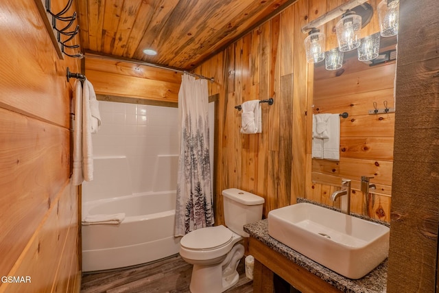 2414 Hackberry Dr, Sevierville, TN 37862 - bathroom featuring wooden ceiling, wood finished floors, wood walls, and shower / bath combination with curtain