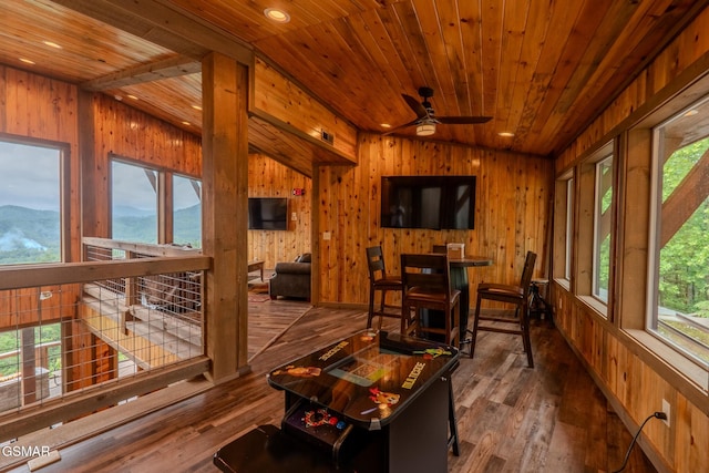 2414 Hackberry Dr, Sevierville, TN 37862 - sunroom / solarium with wood ceiling, hardwood / wood-style flooring, wood walls, vaulted ceiling, and recessed lighting