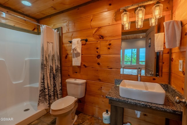 2414 Hackberry Dr, Sevierville, TN 37862 - full bathroom featuring a shower stall, wood walls, and wooden ceiling