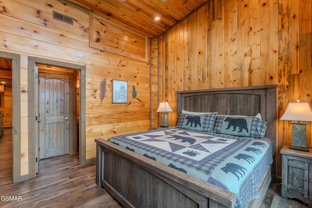 2414 Hackberry Dr, Sevierville, TN 37862 - bedroom with wood ceiling, wood walls, and wood finished floors
