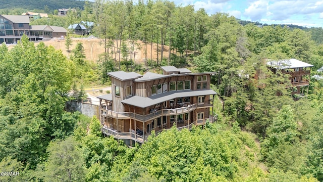 2414 Hackberry Dr, Sevierville, TN 37862 - aerial view of property and surrounding area featuring a heavily wooded area
