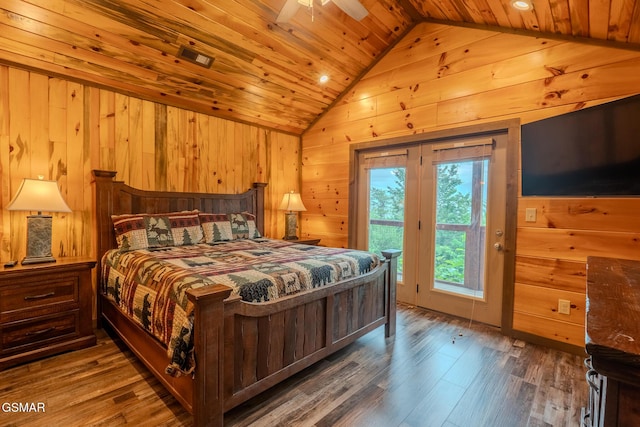 2414 Hackberry Dr, Sevierville, TN 37862 - bedroom with access to outside, vaulted ceiling, wooden walls, wood finished floors, and wooden ceiling