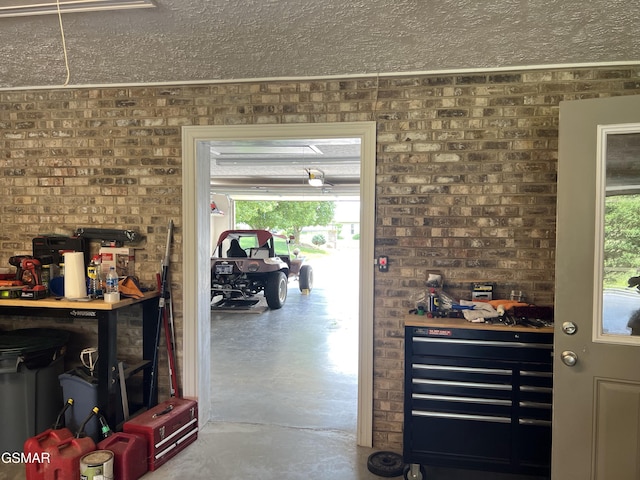 1018 Southwind Cir, Dandridge, TN 37725 - bar featuring concrete floors, a textured ceiling, and plenty of natural light