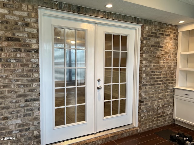 1018 Southwind Cir, Dandridge, TN 37725 - doorway to outside featuring brick wall, french doors, and dark wood finished floors