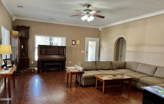 1018 Southwind Cir, Dandridge, TN 37725 - living area featuring arched walkways, ceiling fan, ornamental molding, and dark wood-style floors