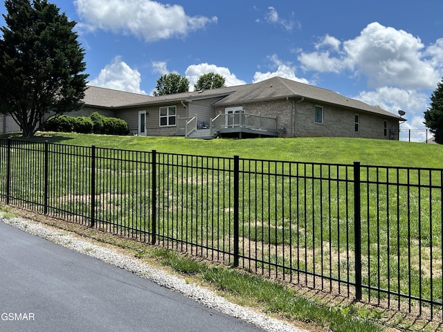 1018 Southwind Cir, Dandridge, TN 37725 - ranch-style house featuring a wooden deck and a fenced backyard