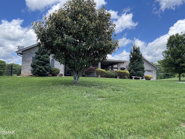 1018 Southwind Cir, Dandridge, TN 37725 - view of property exterior with an attached carport and brick siding