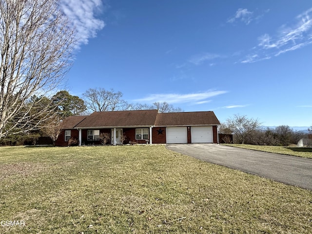 ranch-style house with a garage, a front lawn, aphalt driveway, and brick siding