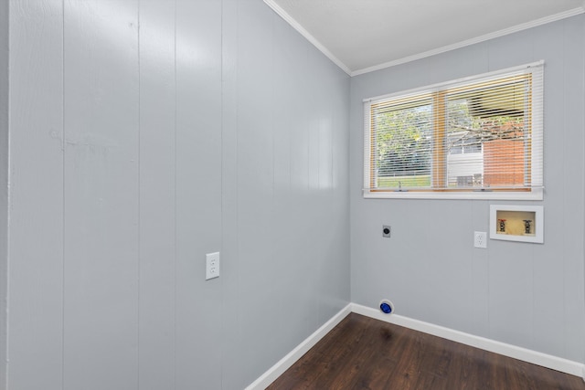 washroom featuring hookup for an electric dryer, dark hardwood / wood-style flooring, ornamental molding, and washer hookup