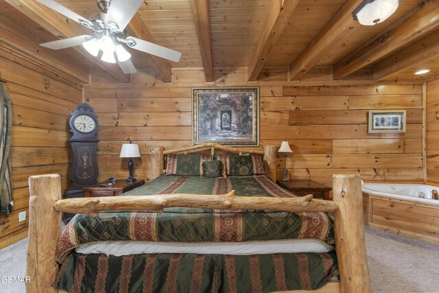 carpeted bedroom featuring beam ceiling, ceiling fan, wooden walls, and wood ceiling