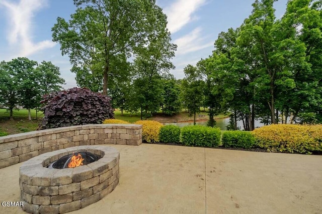 118 Luxury Ln, Dandridge, TN 37725 - view of patio / terrace featuring an outdoor fire pit and a water view