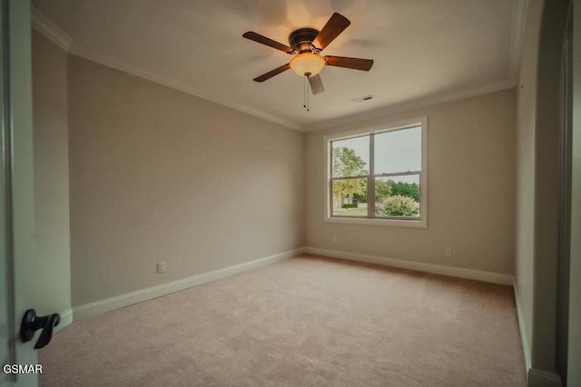 118 Luxury Ln, Dandridge, TN 37725 - spare room with light colored carpet, baseboards, crown molding, and ceiling fan