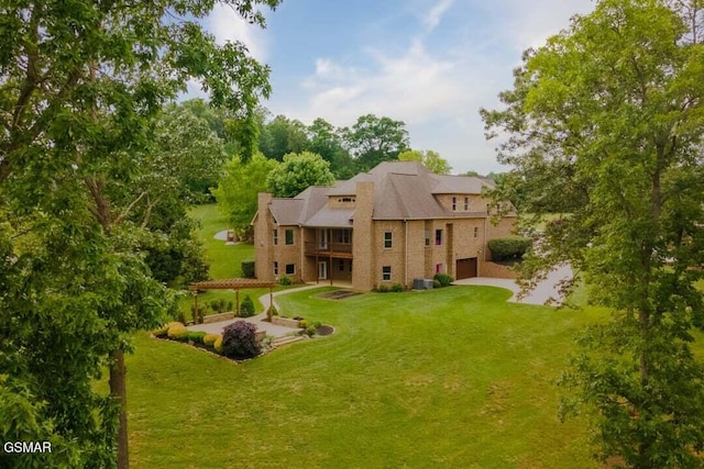 118 Luxury Ln, Dandridge, TN 37725 - rear view of property featuring a lawn, a garage, a patio area, a gazebo, and central air condition unit