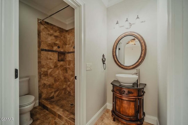 118 Luxury Ln, Dandridge, TN 37725 - full bathroom featuring toilet, vanity, tiled shower, and baseboards