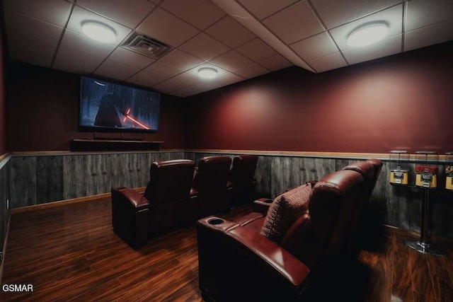 118 Luxury Ln, Dandridge, TN 37725 - home theater room featuring wood finished floors, a paneled ceiling, and a wainscoted wall