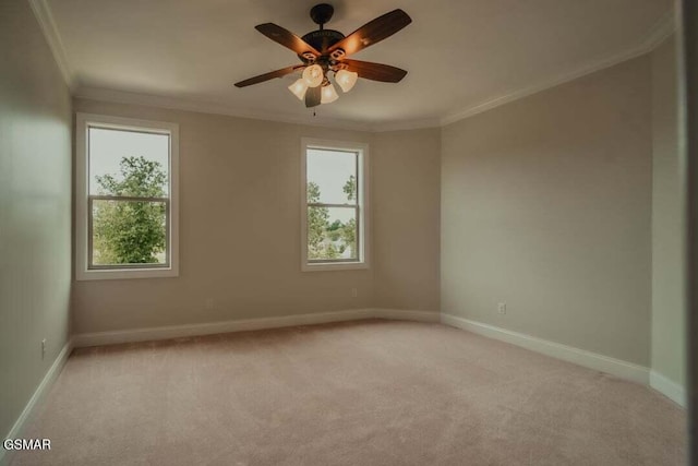 118 Luxury Ln, Dandridge, TN 37725 - empty room featuring light carpet, ornamental molding, healthy amount of natural light, baseboards, and a ceiling fan