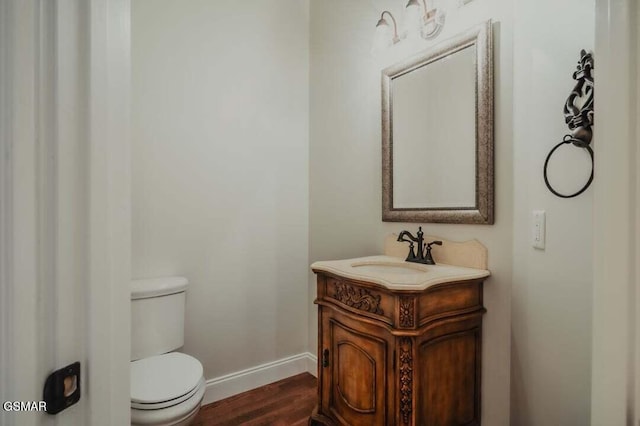 118 Luxury Ln, Dandridge, TN 37725 - bathroom featuring toilet, baseboards, vanity, and wood finished floors