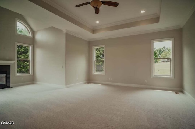118 Luxury Ln, Dandridge, TN 37725 - spare room with carpet flooring, baseboards, a ceiling fan, crown molding, and a fireplace with flush hearth