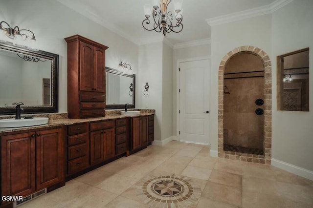 118 Luxury Ln, Dandridge, TN 37725 - full bathroom featuring double vanity, a tile shower, crown molding, a chandelier, and baseboards