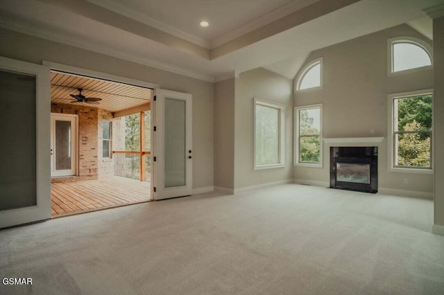 118 Luxury Ln, Dandridge, TN 37725 - unfurnished living room with plenty of natural light, carpet, a fireplace with flush hearth, recessed lighting, and crown molding