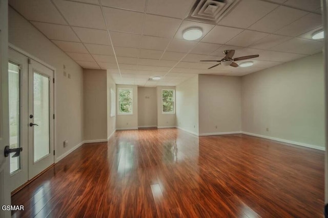 118 Luxury Ln, Dandridge, TN 37725 - spare room featuring wood finished floors, a drop ceiling, baseboards, a ceiling fan, and french doors