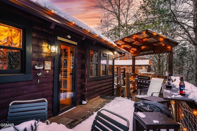 exterior space featuring outdoor dining area and area for grilling