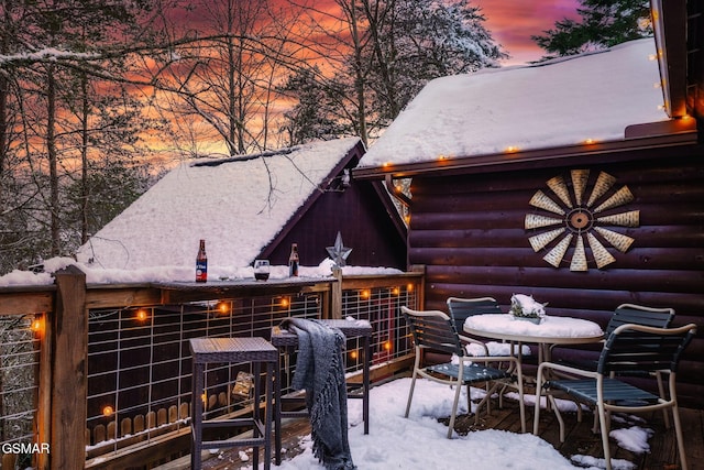 view of snow covered patio