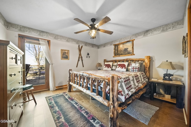 bedroom featuring access to exterior and ceiling fan