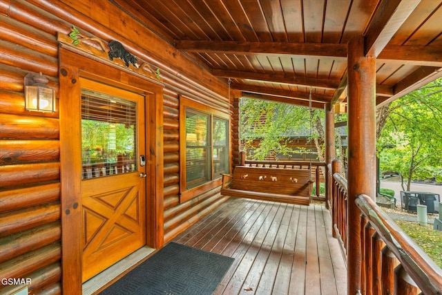 wooden terrace featuring a porch