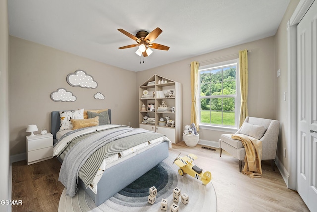 412 Apple Valley Rd, Sevierville, TN 37862 - bedroom with light wood-type flooring and ceiling fan