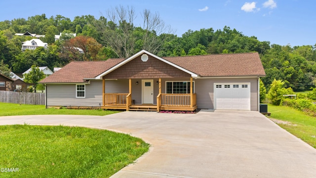 412 Apple Valley Rd, Sevierville, TN 37862 - single story home with driveway, an attached garage, and a porch