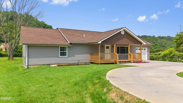 412 Apple Valley Rd, Sevierville, TN 37862 - view of front of property with a front lawn, driveway, roof with shingles, and a garage