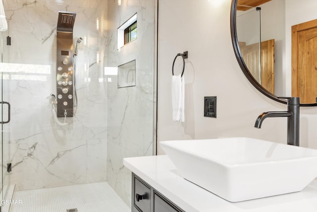 bathroom with vanity and an enclosed shower