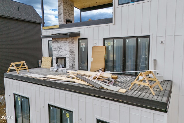 exterior space featuring an outdoor brick fireplace