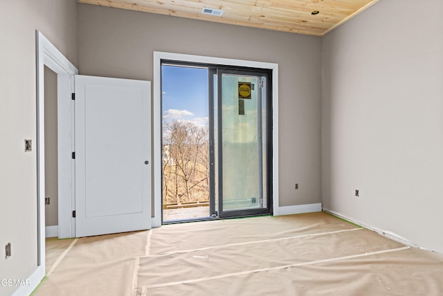 spare room with wooden ceiling